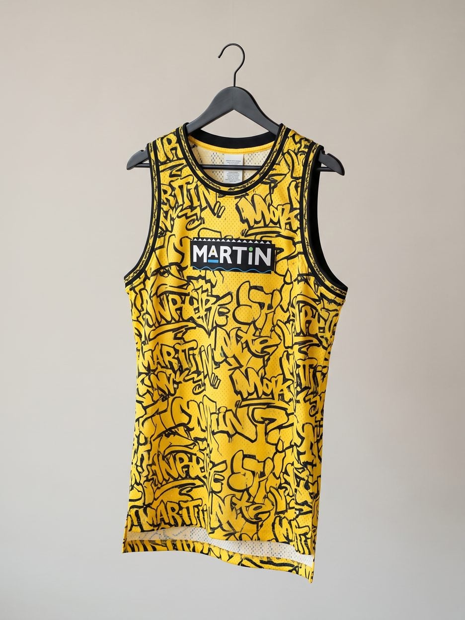 This jersey on a hanger, close enough to see the stitching, the fabric and the tags