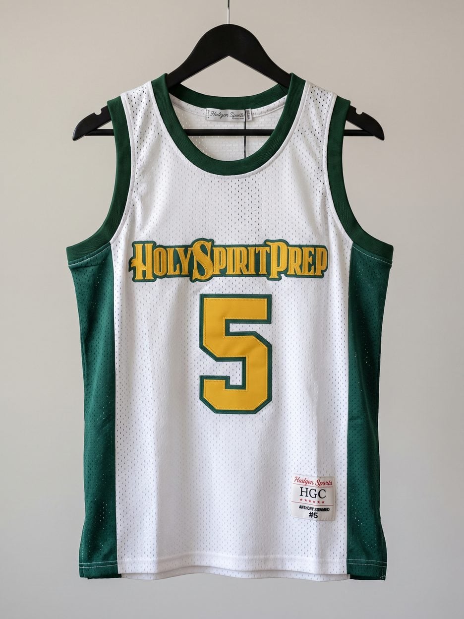 This jersey on a hanger, close enough to see the stitching, the fabric and the tags