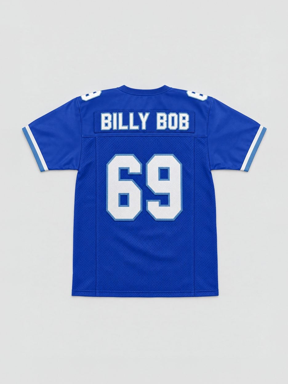The Billy Bob #69 West Canaan Coyotes Football Jersey laid flat, from the back: the stitched name plate and number on a mesh body