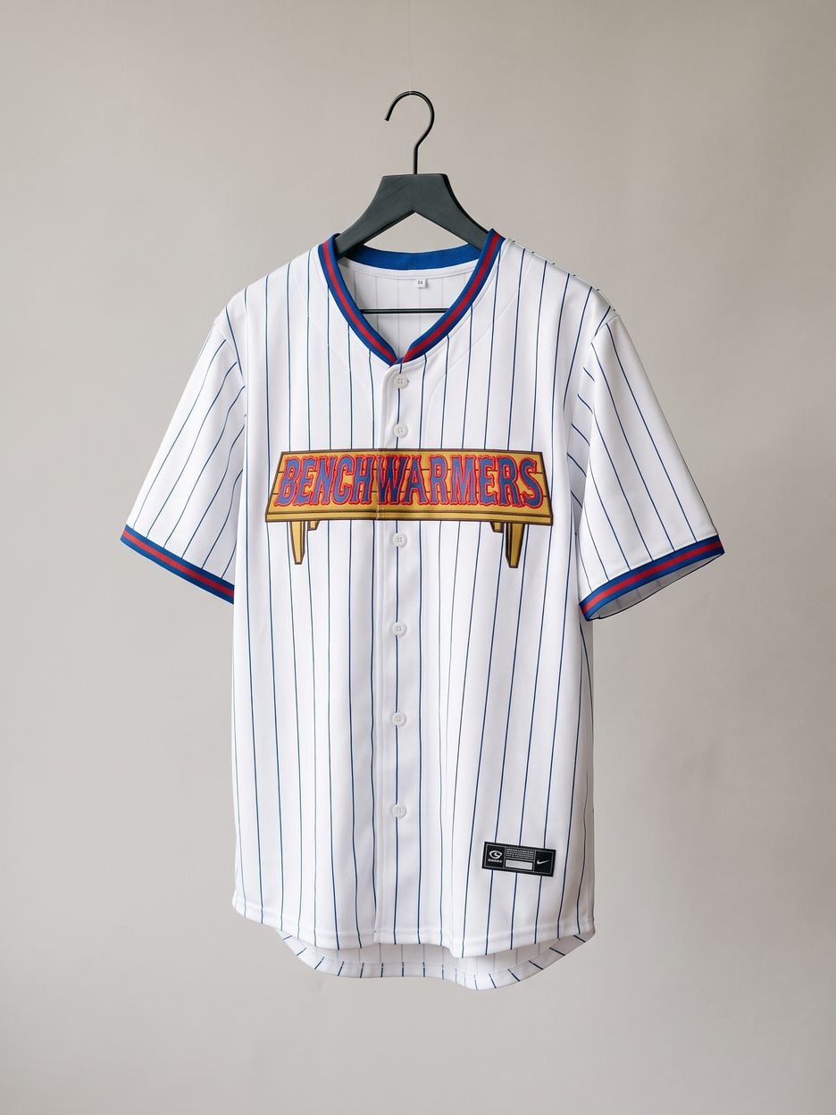 This jersey on a hanger, close enough to see the stitching, the fabric and the tags