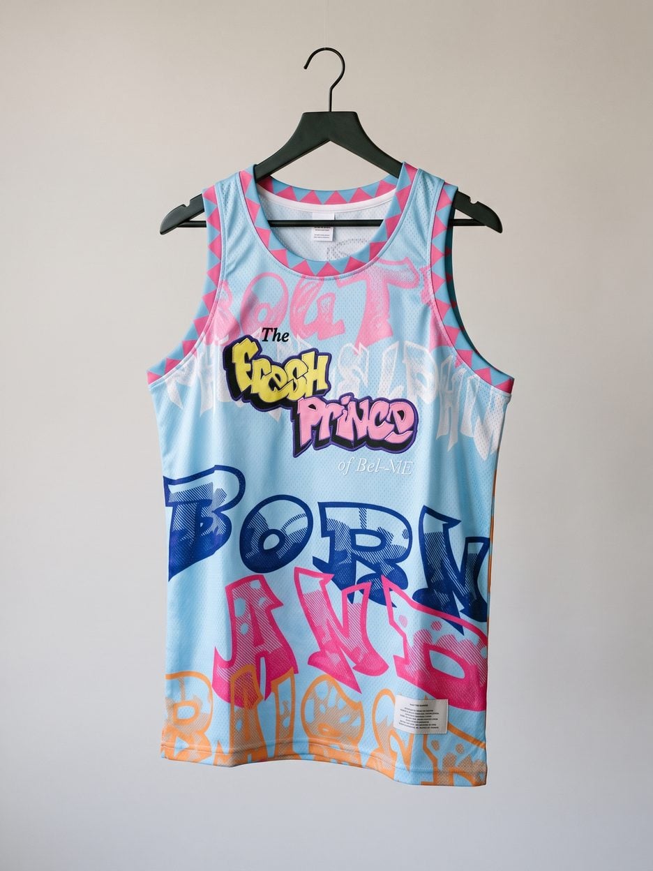 This jersey on a hanger, close enough to see the stitching, the fabric and the tags
