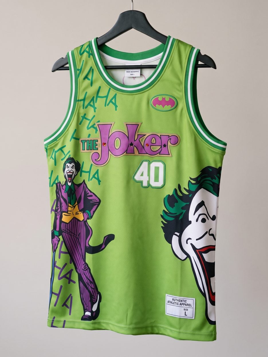 This jersey on a hanger, close enough to see the stitching, the fabric and the tags