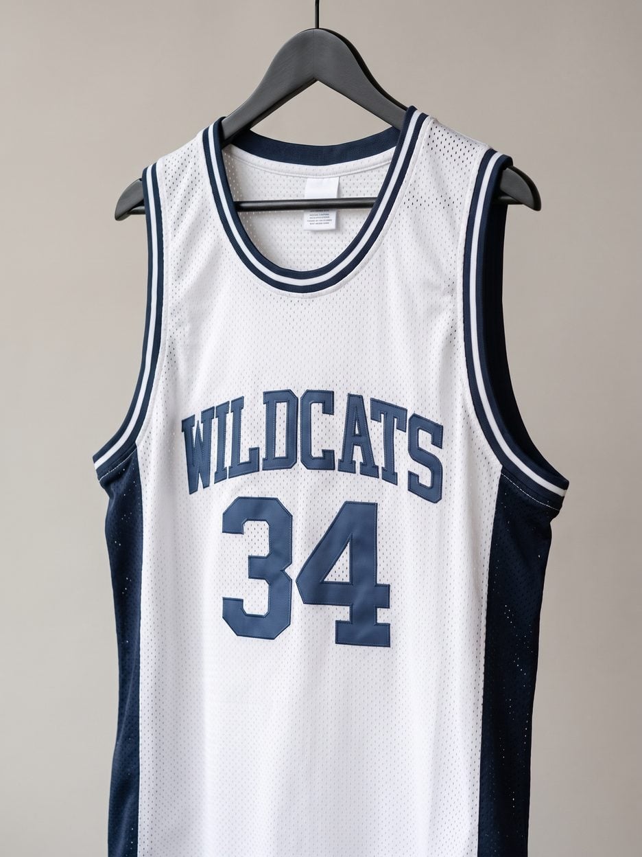 This jersey on a hanger, close enough to see the stitching, the fabric and the tags